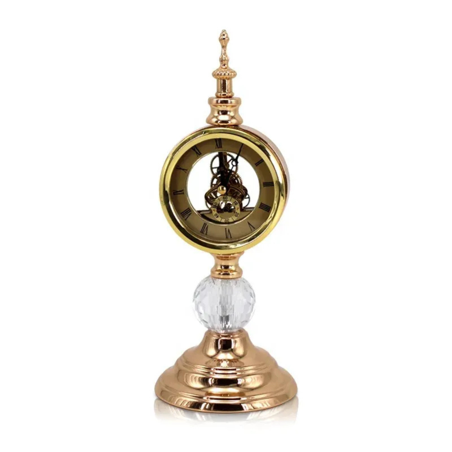 Decorative clock with gold and crystal design on a white background