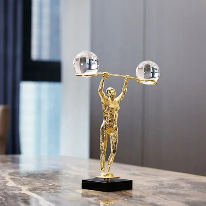 Minimalistische Strongman Dekofigur in Gold – Kraft & Eleganz